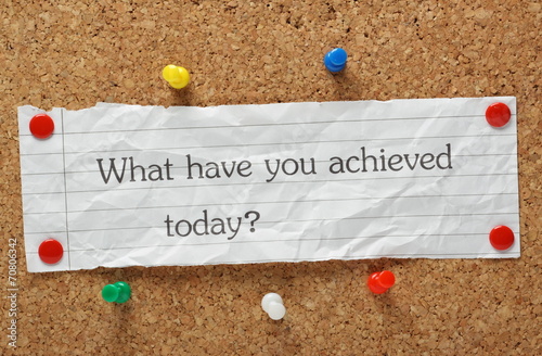 What have you achieved today reminder on a cork notice board