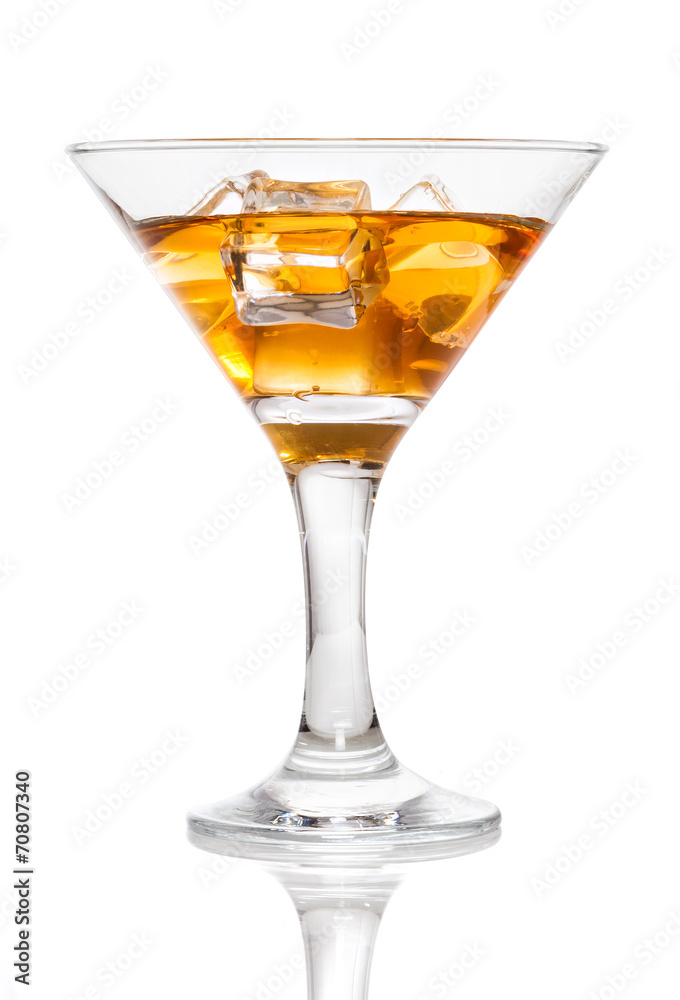 Glass of whiskey with ice, isolated on white background