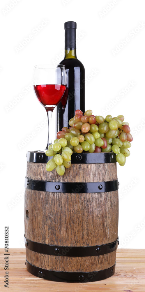 Wine in goblet and in bottle and grapes