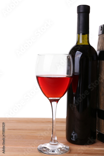 Wine in goblet and in bottle, grapes