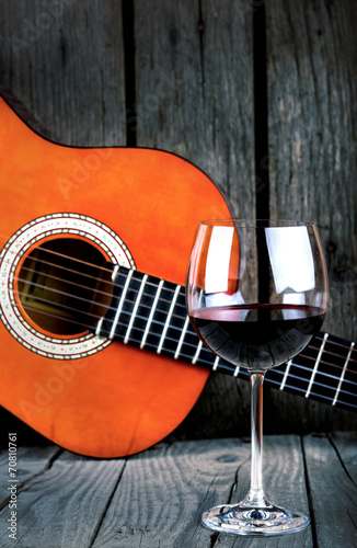 Photography Wine and Guitar on a wooden table vintage retro photo