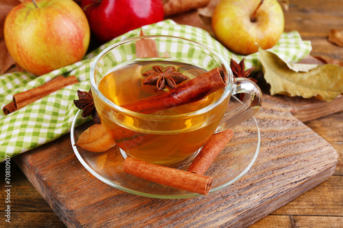 Composition of  apple cider with cinnamon sticks  fresh apples