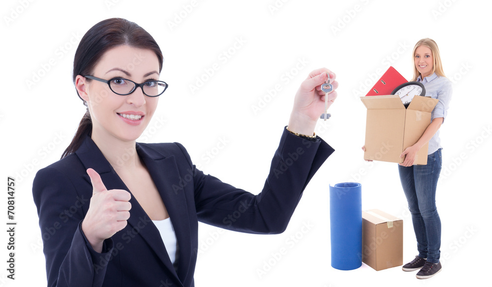 moving day concept - business woman with metal key and girl with moving day concept - business woman with metal key and girl with