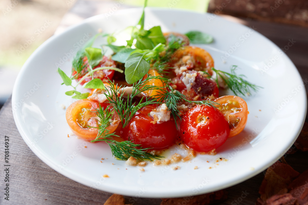 Simple appetizer with cherry tomatoes and smoked duck fillet Simple appetizer with cherry tomatoes and smoked duck fillet