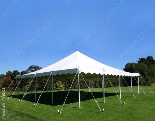 white events tent on a green lawn
