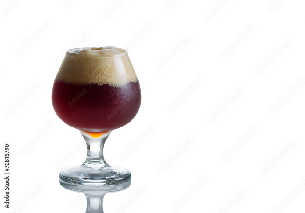 Glass Goblet filled with fresh Dark Beer on White Glass Goblet filled with fresh Dark Beer on White