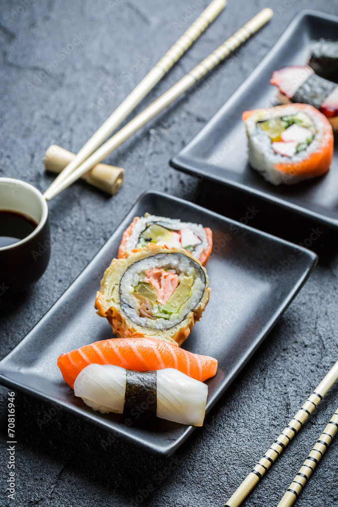 Close up of fresh sushi with soy sauce Close up of fresh sushi with soy sauce