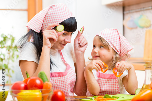 mom and kid preparing healt...