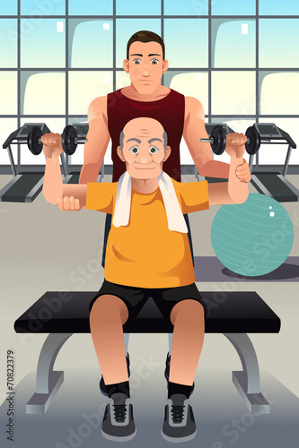 Personal trainer training an elderly man