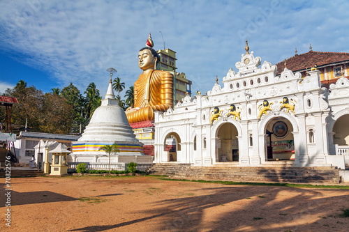 Golden Buddha statue in Tamgalle temple, Sri Lanka.