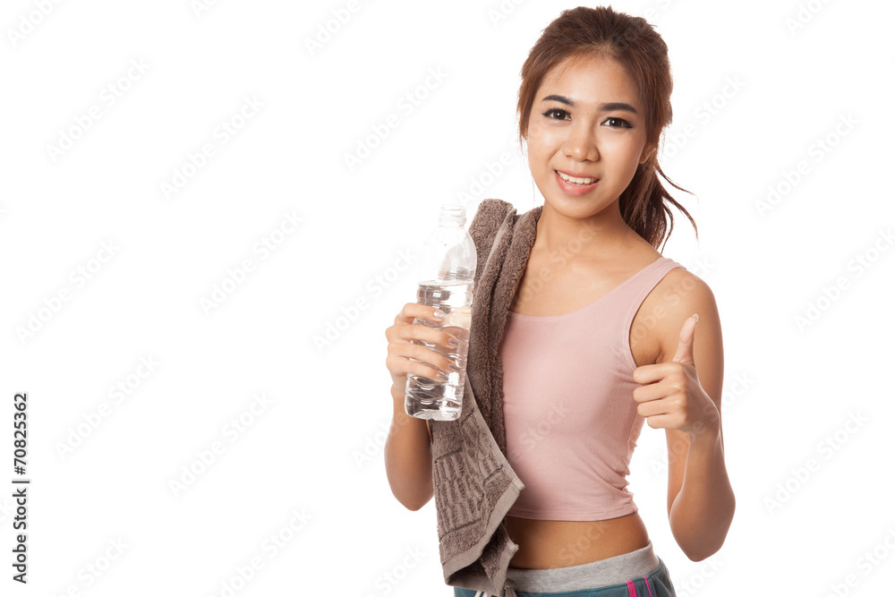 Happy Workout Asian girl show thumbs up with bottle of water Happy Workout Asian girl show thumbs up with bottle of water