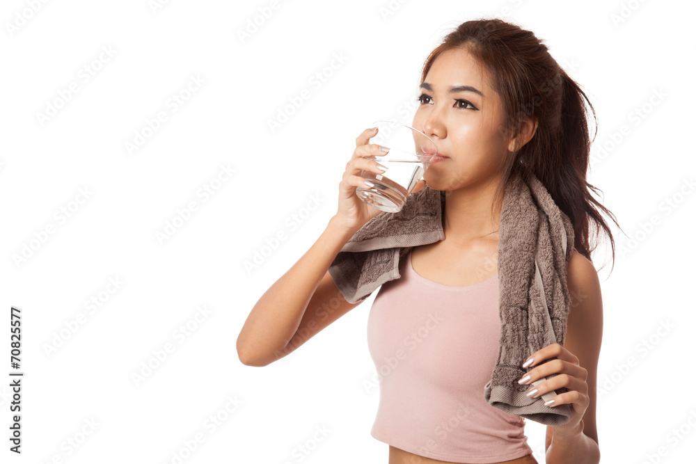 Tired workout asian woman drinking water Tired workout asian woman drinking water