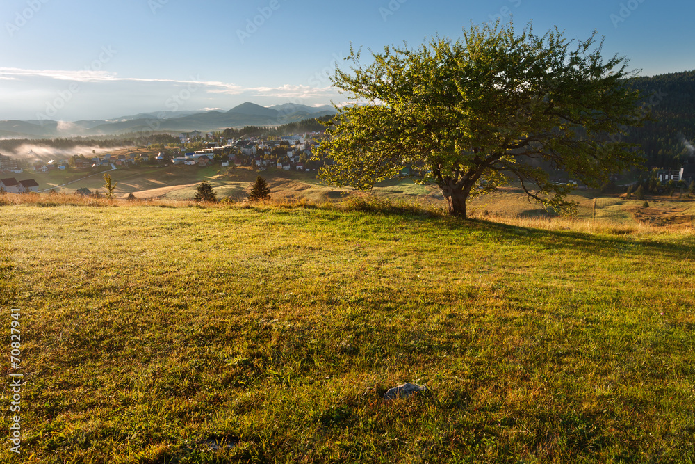Fototapeta premium Sunrise with a view on the mountain resort