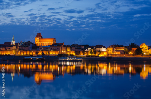 Torun (Poland) at night. The view from Vistula river