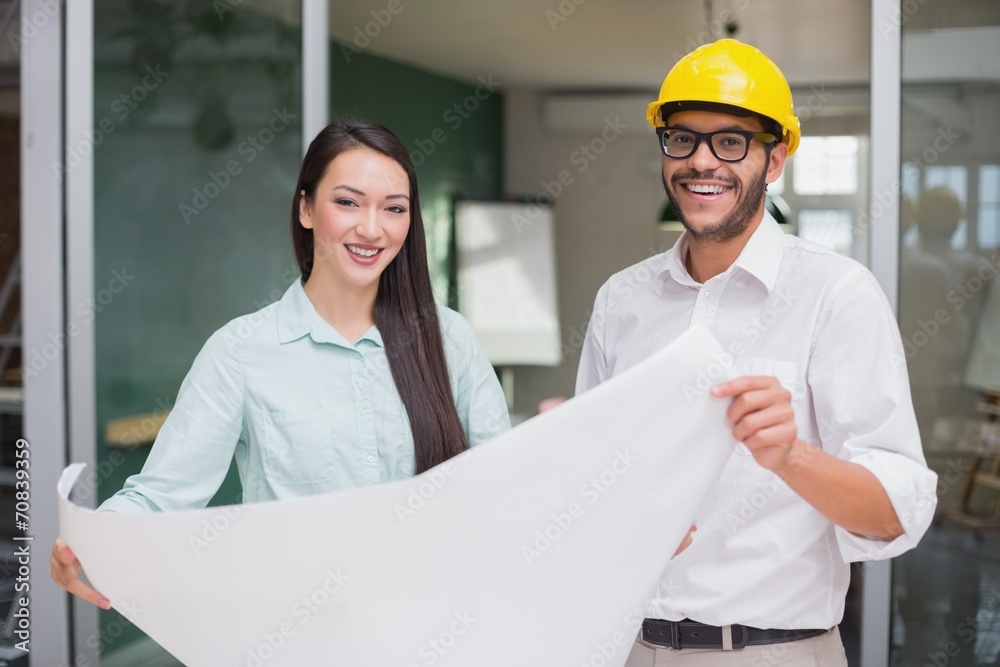 Casual architecture team working together at desk Casual architecture team working together at desk