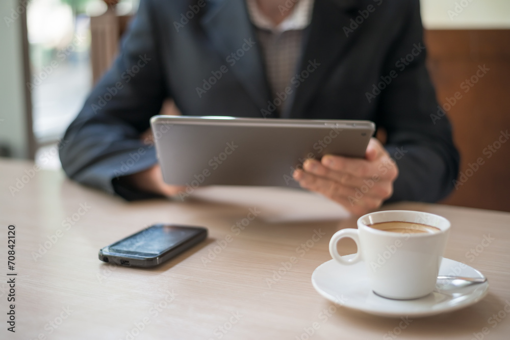 Man uses a digital tablet Man uses a digital tablet