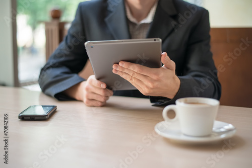 Man uses a digital tablet