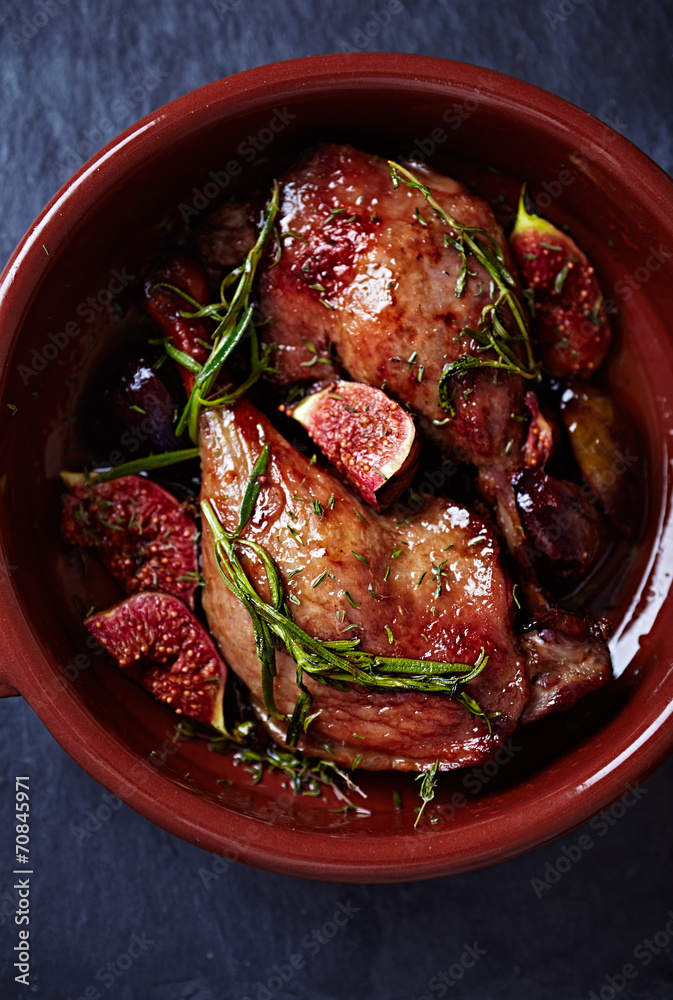 Oven-baked duck legs with figs and rosemary Stock Photo | Adobe Stock