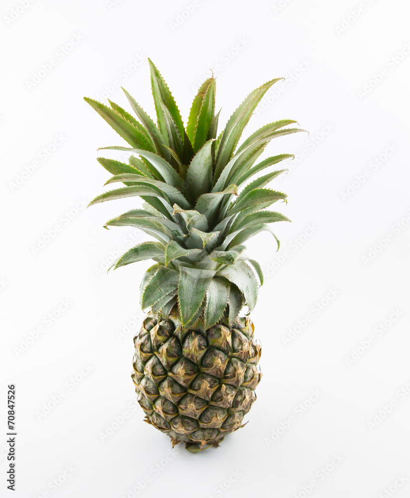 Fototapeta premium ripe pineapple isolated on white background
