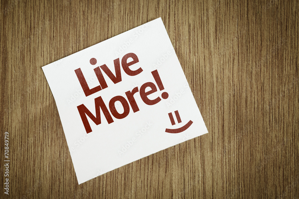 Live More on Paper Note with texture background Live More on Paper Note with texture background