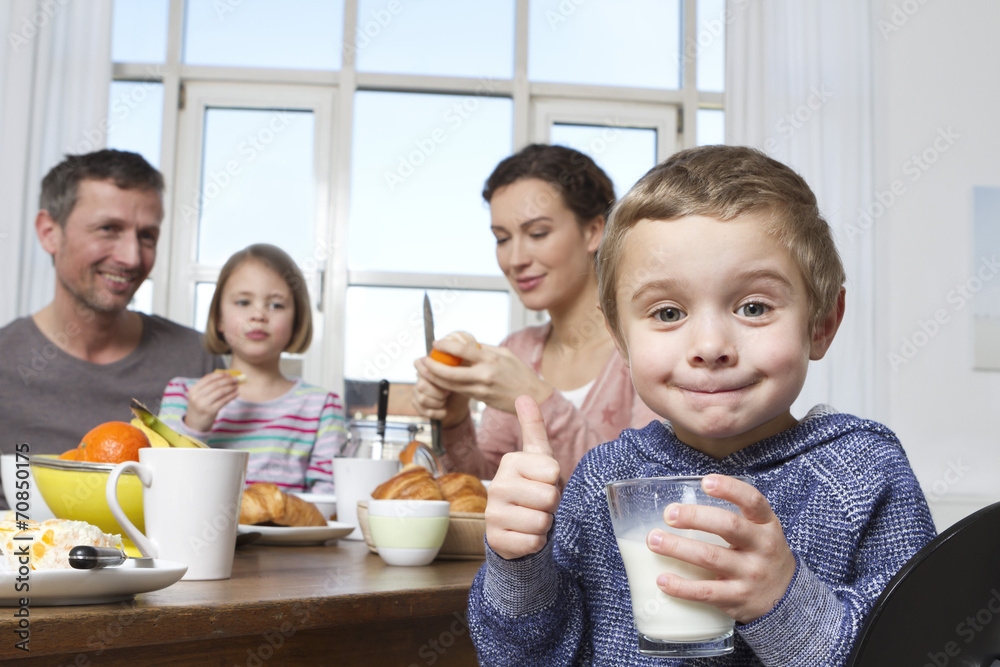 Family of four having healthy breakfast Family of four having healthy breakfast