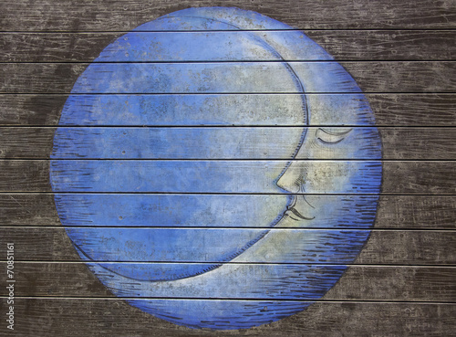 Blue moon painting on the wooden floor