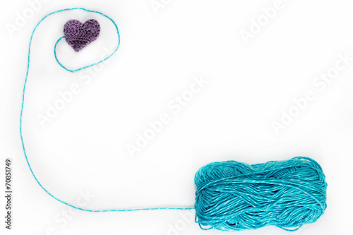 blue skein with crochet heart