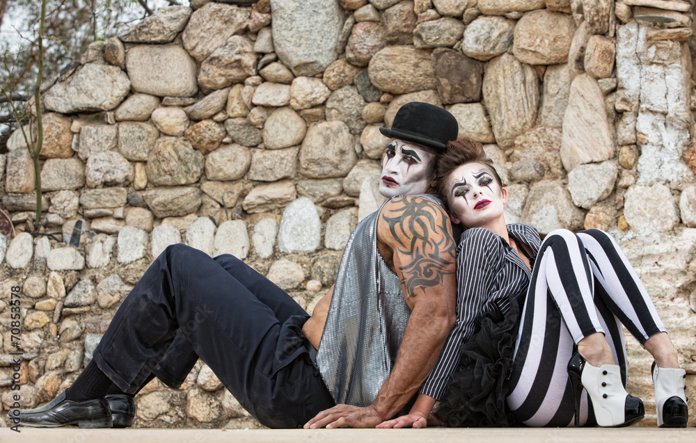 Clowns Sitting Back to Back Clowns Sitting Back to Back