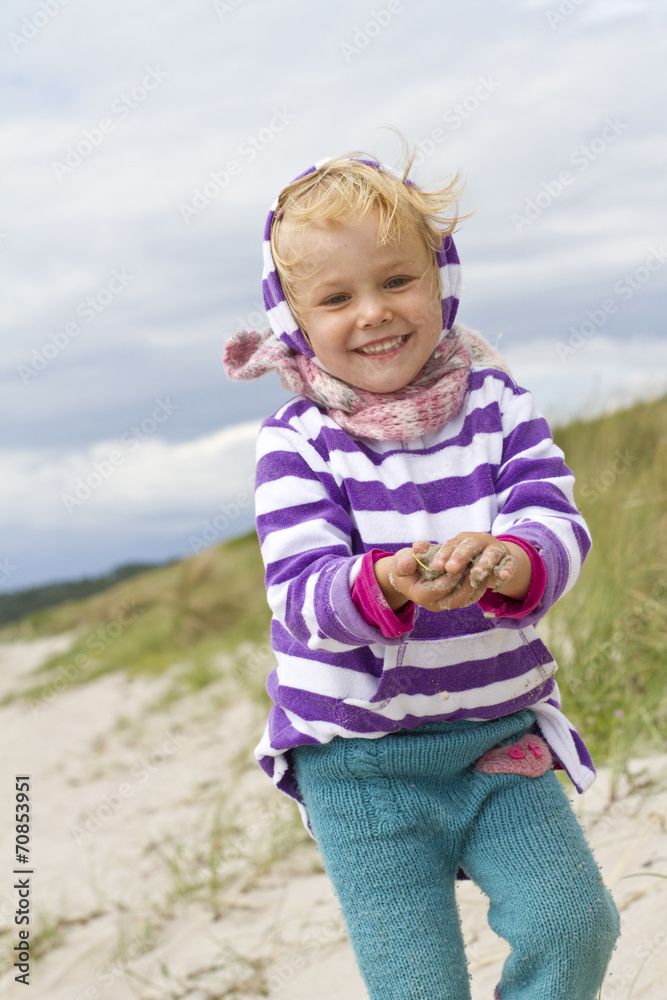 Denmark, Ringkoebing, little girl walking on the beach Denmark, Ringkoebing, little girl walking on the beach