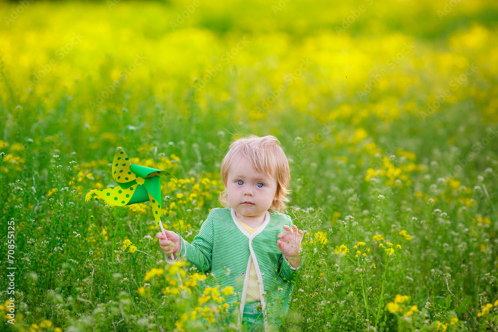 happy child in a field with yellow flowers happy child in a field with yellow flowers