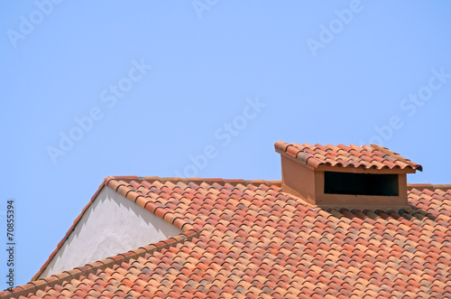 Tiled roof with chimney
