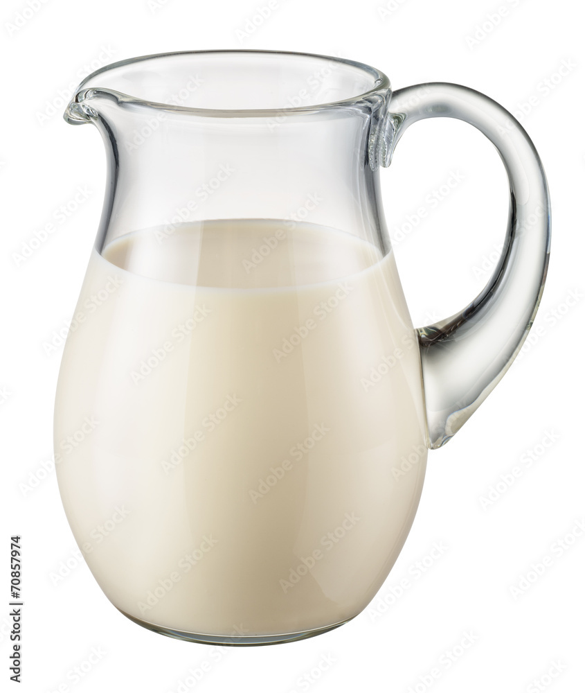 Glass pitcher of fresh milk isolated on white background. With c Glass pitcher of fresh milk isolated on white background. With c