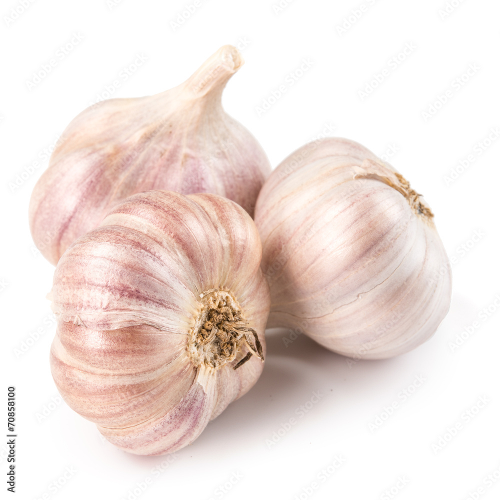 Fototapeta premium Garlic cloves on white background