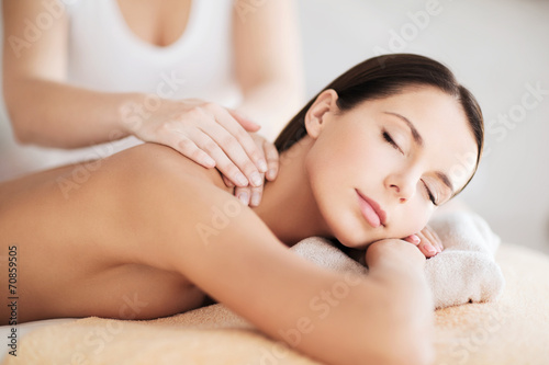 beautiful woman in spa having massage