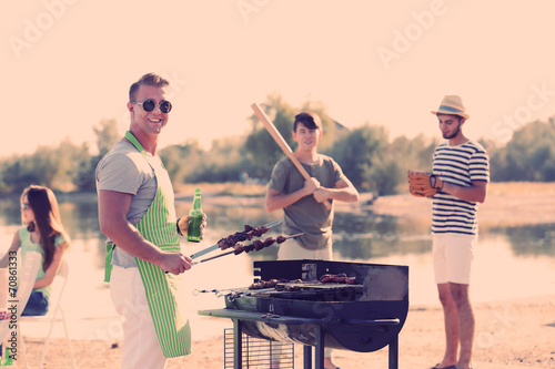 Happy friends on rest at beach