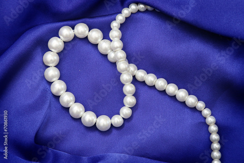 High resolution blue satin background with pearls