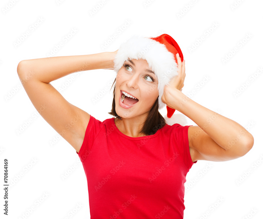 surprised woman in santa helper hat surprised woman in santa helper hat
