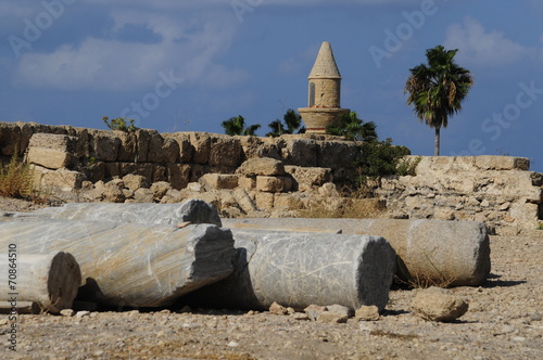 Old Beacon and Bosnian Mosque at ancient Ceasarea port photo