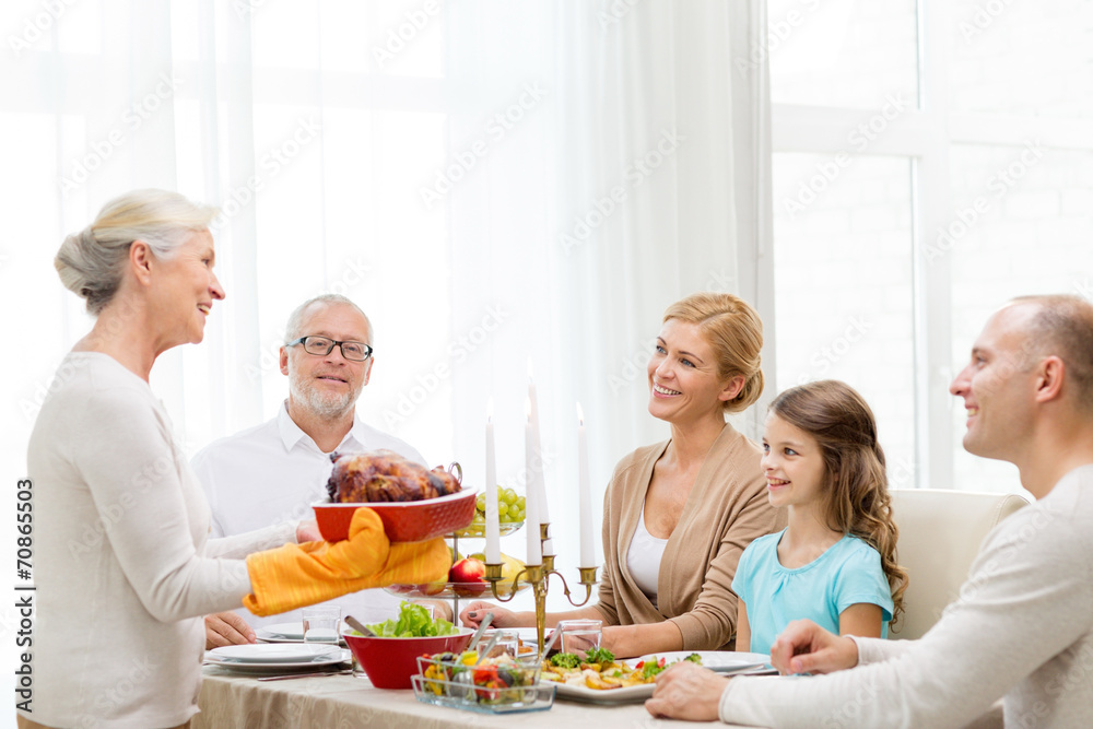 smiling family having holiday dinner at home