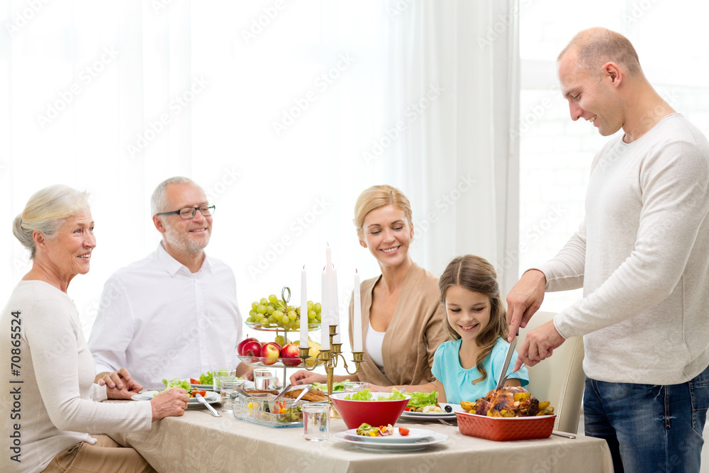 smiling family having holiday dinner at home smiling family having holiday dinner at home