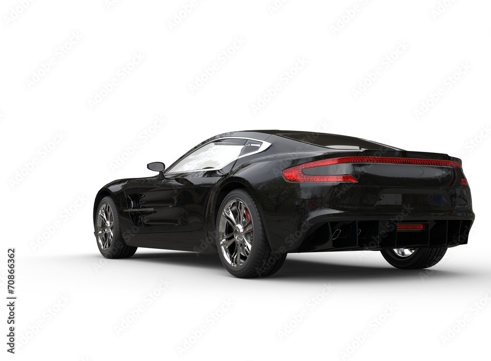 Black luxury sports car on white background - back - side view