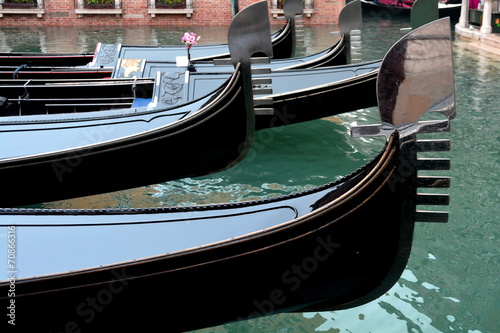 Venice Italy and gondolas waiting for passengers. #70866316