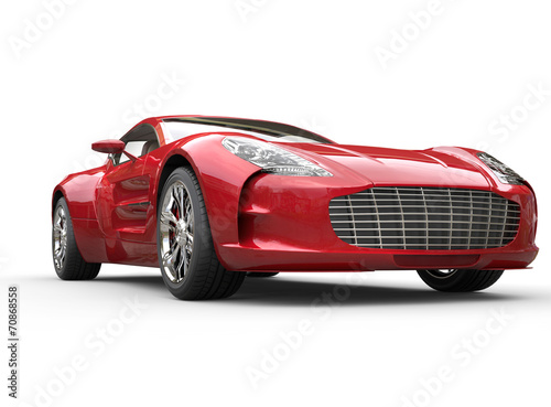 Red metallic car on white background © technicolors