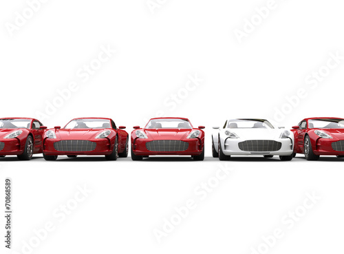 Row of red and white metallic cars on white background