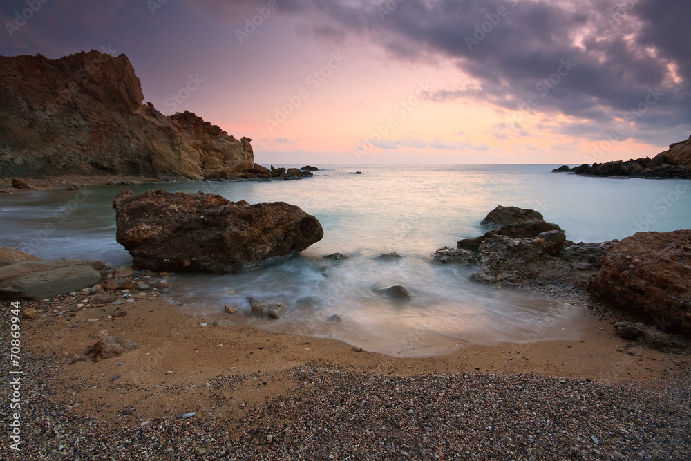 Sunset over the sea in Crete, Greece.