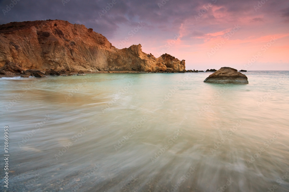 Sunset on a beach in Crete, Greece.