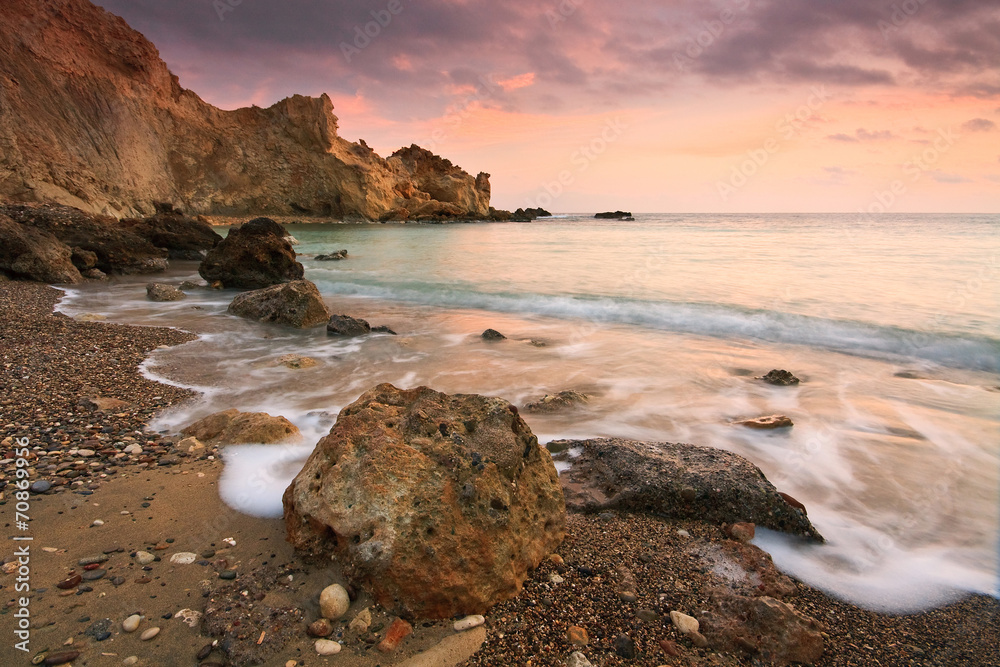 Sunset on a beach in Crete, Greece.