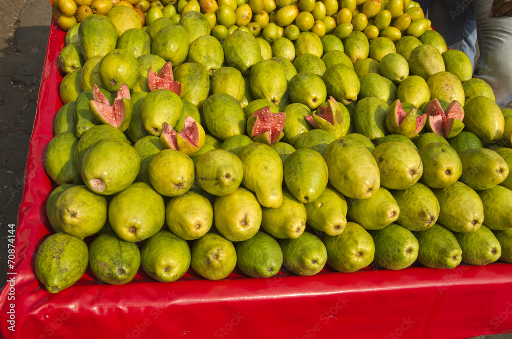 fresh sweet guava fruits group in street market , India