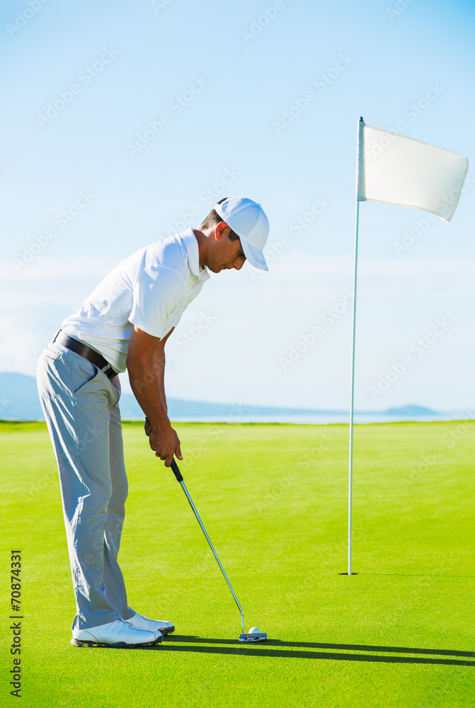 Fototapeta premium Golfer on Putting Green