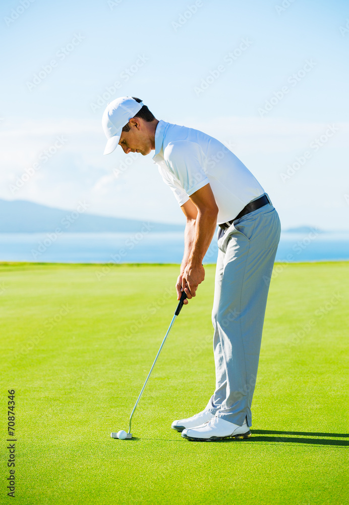 Fototapeta premium Golfer on Putting Green